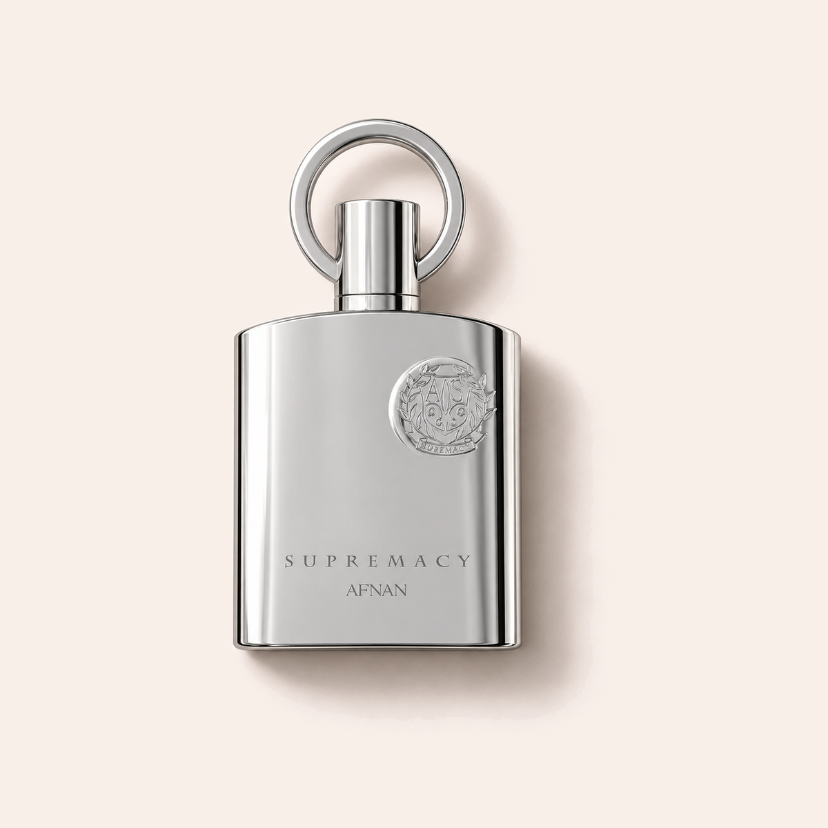 Flakon Afnan Supremacy Silver EDP 100 ml na pudrově růžovém pozadí – MrRizz