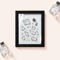 Parfemovy obraz Maison Francis Kurkdjian Gentle Fluidity Silver v cernem ramu - ilustracni fotografie