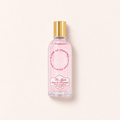 Flakon Jeanne en Provence Un Matin dans la Roseraie EDP 60 ml na béžovém pozadí – MrRizz